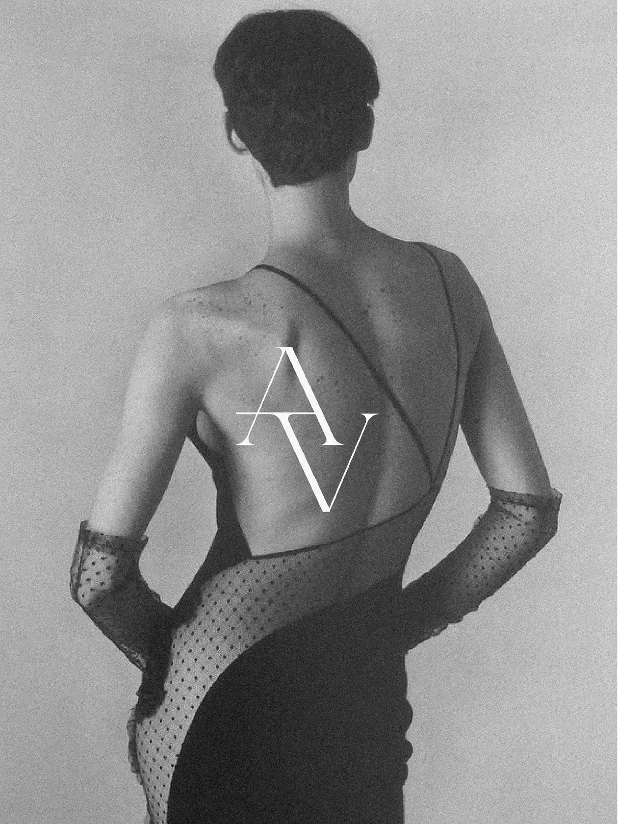 White AV monogram over a black-and-white photo of a woman in a backless dress and dotted tulle gloves, for Aesthevision.