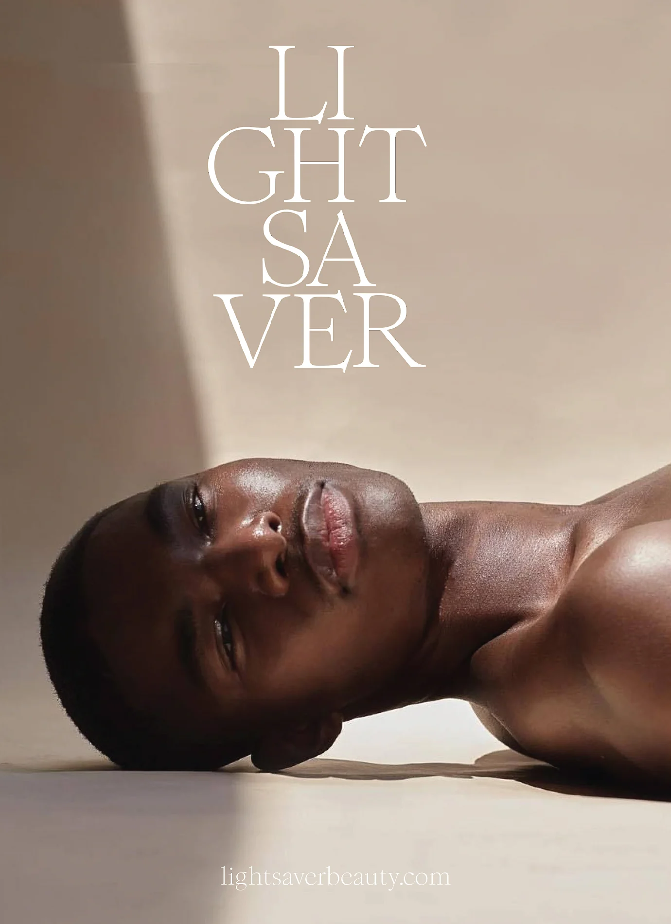 Poster of a shirtless man lying on a beige floor in sunlight, stacked serif wordmark above, for Lightsaver.